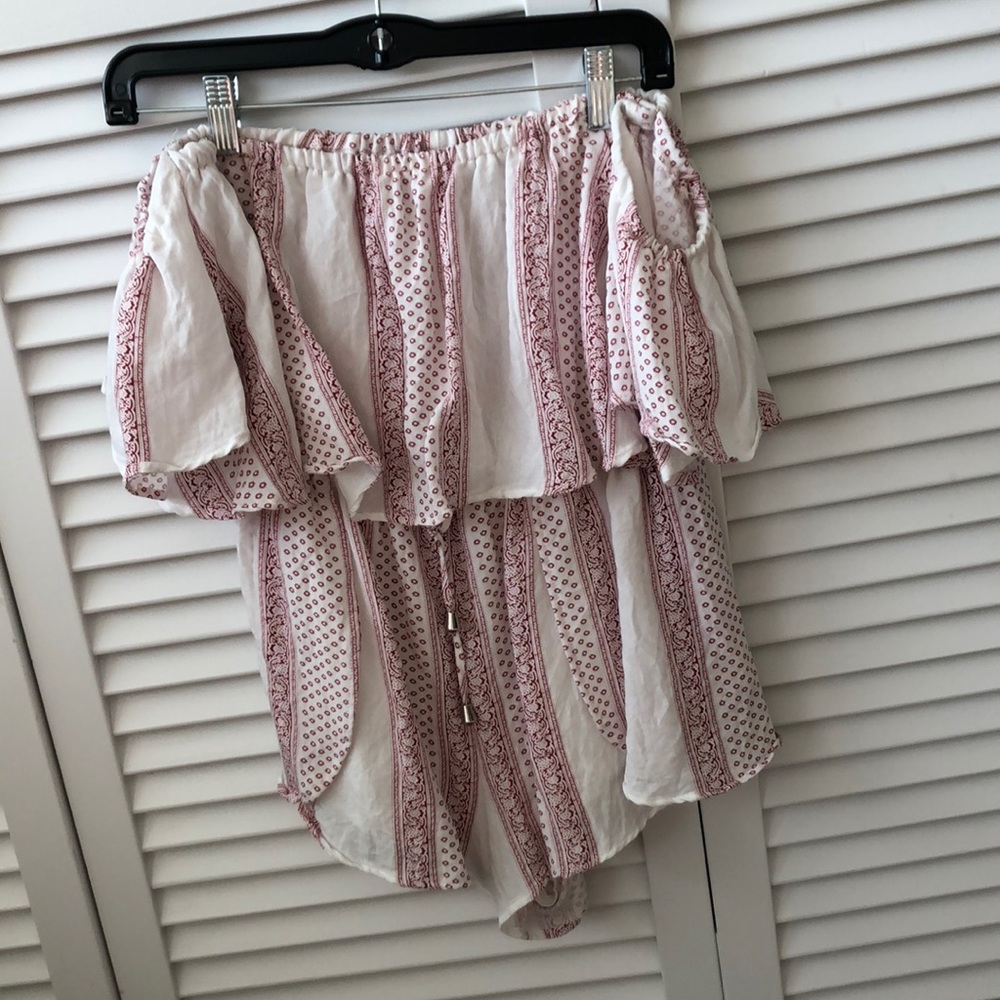 Red and white patterned L’atiste by Amy romper